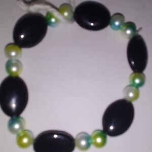Black Oval Bead Bracelet with Green and Pearl Accent Beads